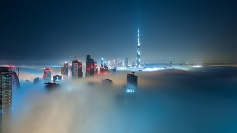 Dubai Skyline at Night — Blue, Dramatic, Photograph, Skyscrapers, Clouds
