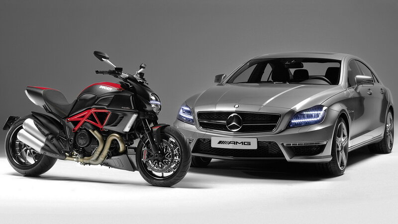 Ducati Motorcycle and Mercedes Car