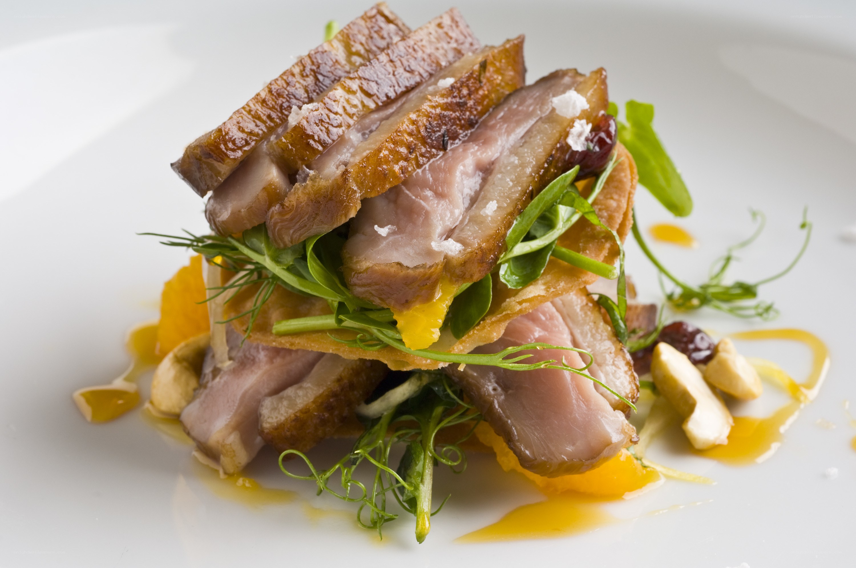 Duck breast with orange and greens