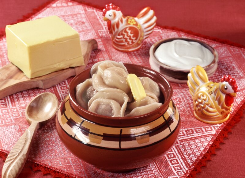 Dumplings with butter and sour cream