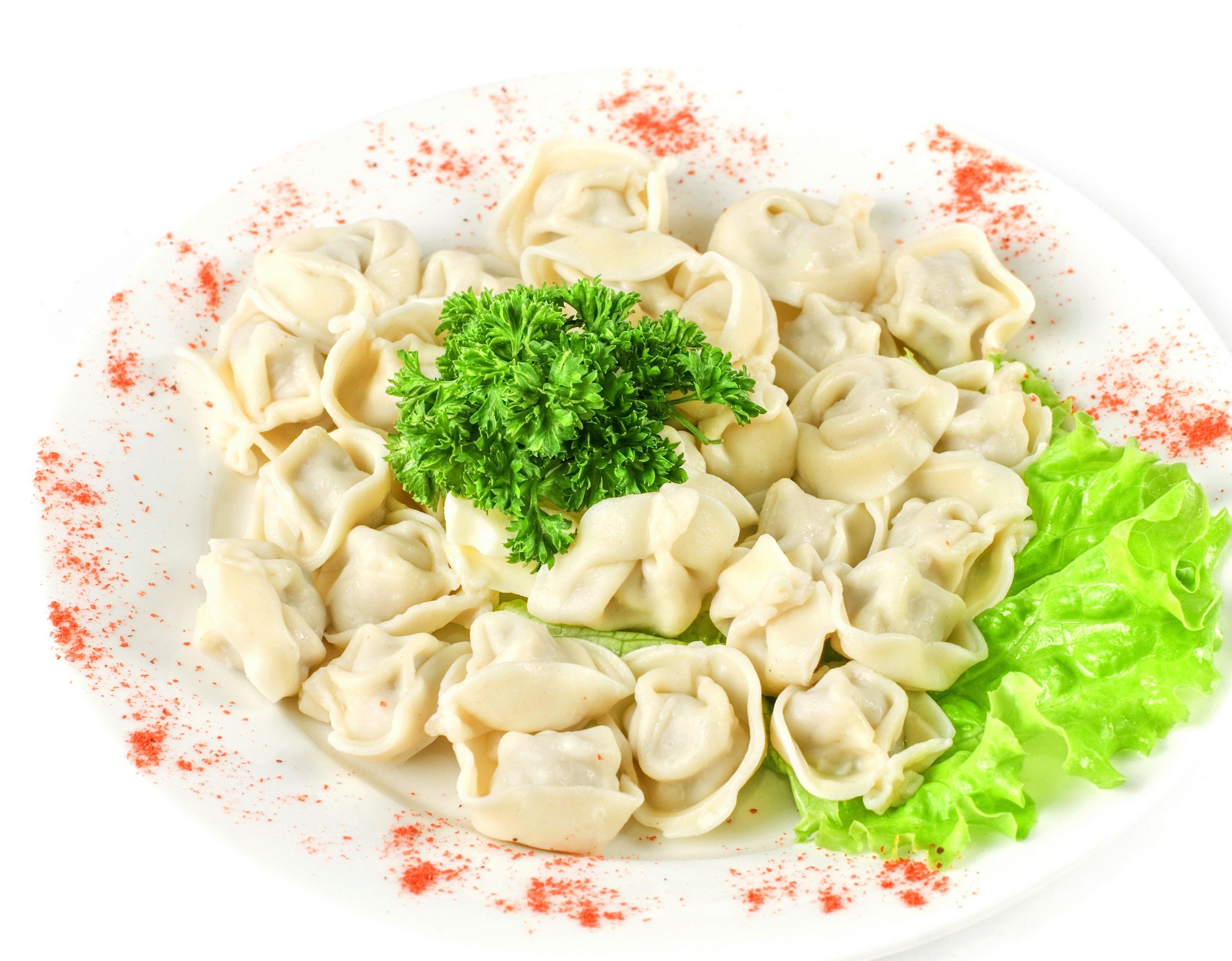 dumplings with parsley garnish