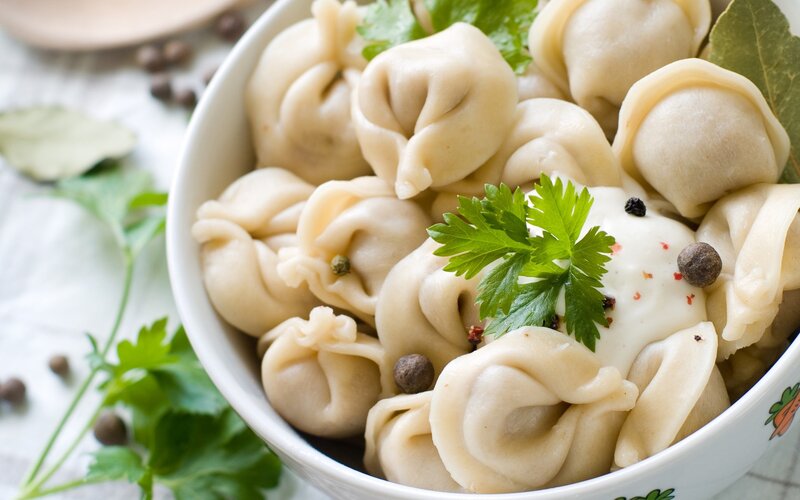 Dumplings with sour cream and herbs
