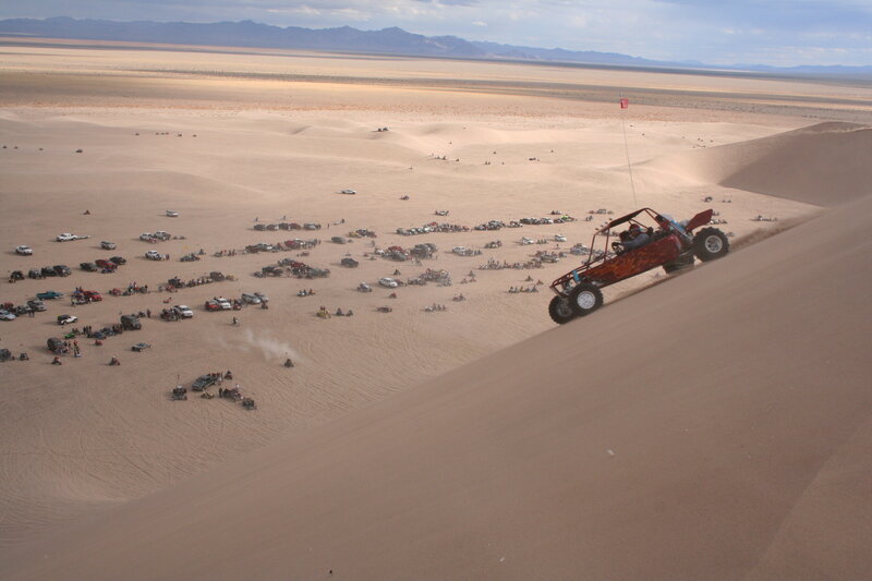 Dune buggy racing in desert