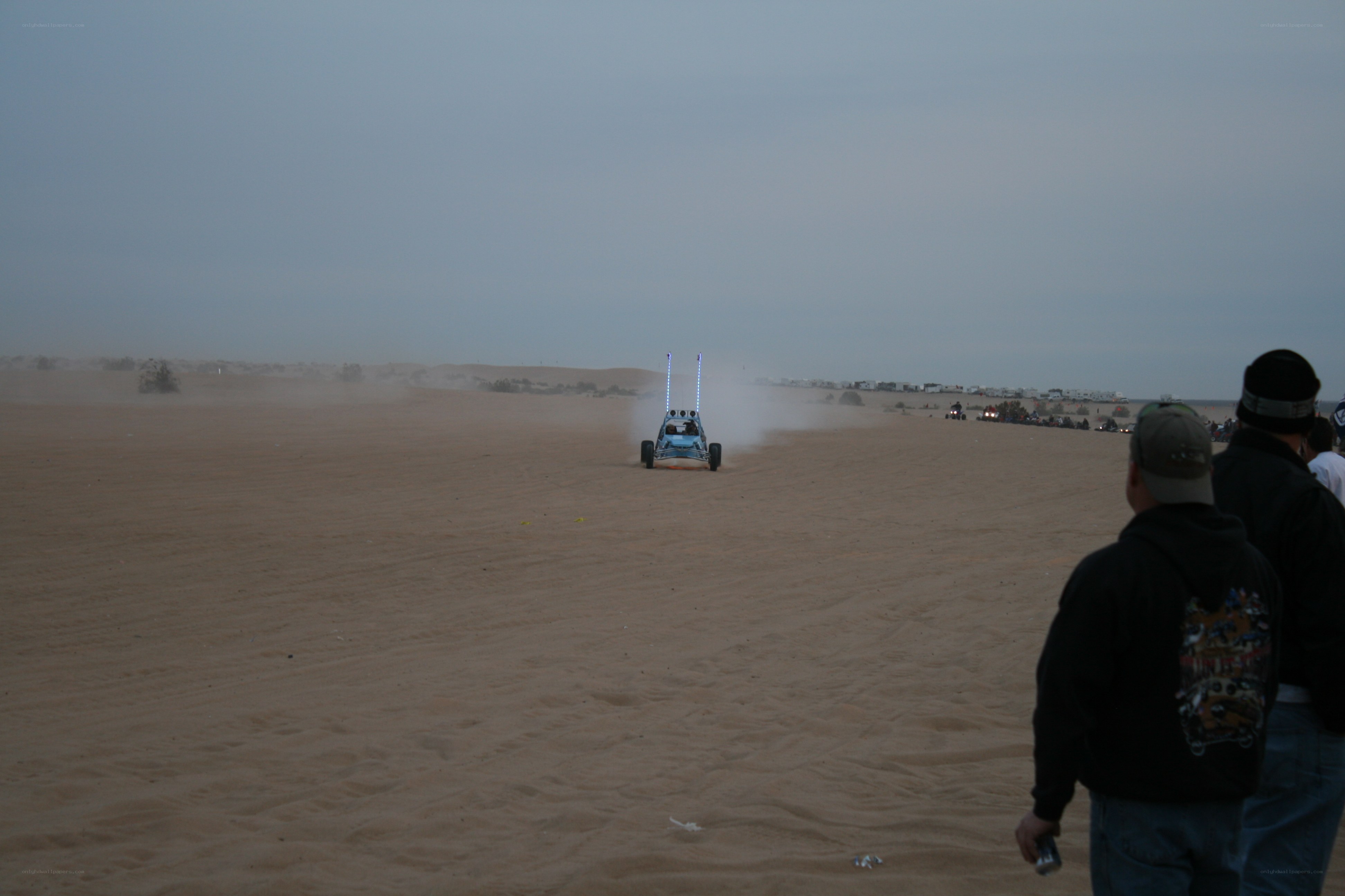 Dune buggy racing in desert