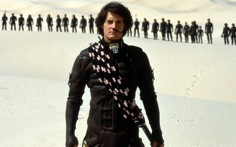 Dune character in desert scene