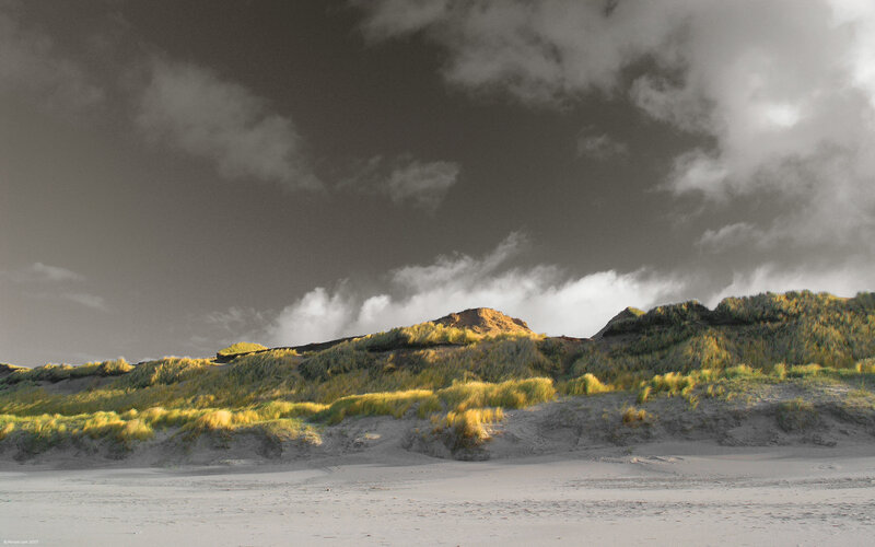 Dunes under stormy sky