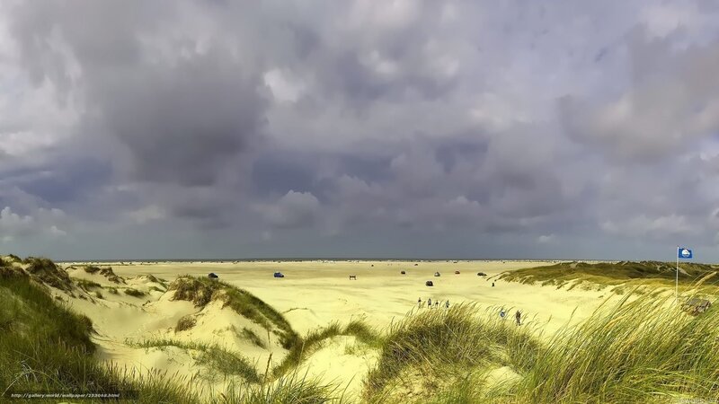 Dunes under stormy sky