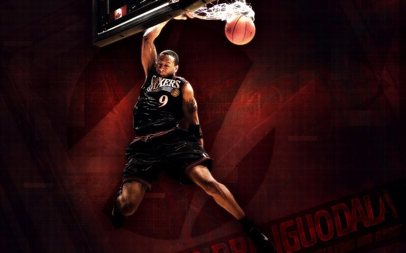 Dunking basketball player
