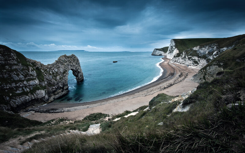 Durdle Door Arch — Blue, Dramatic, Afternoon