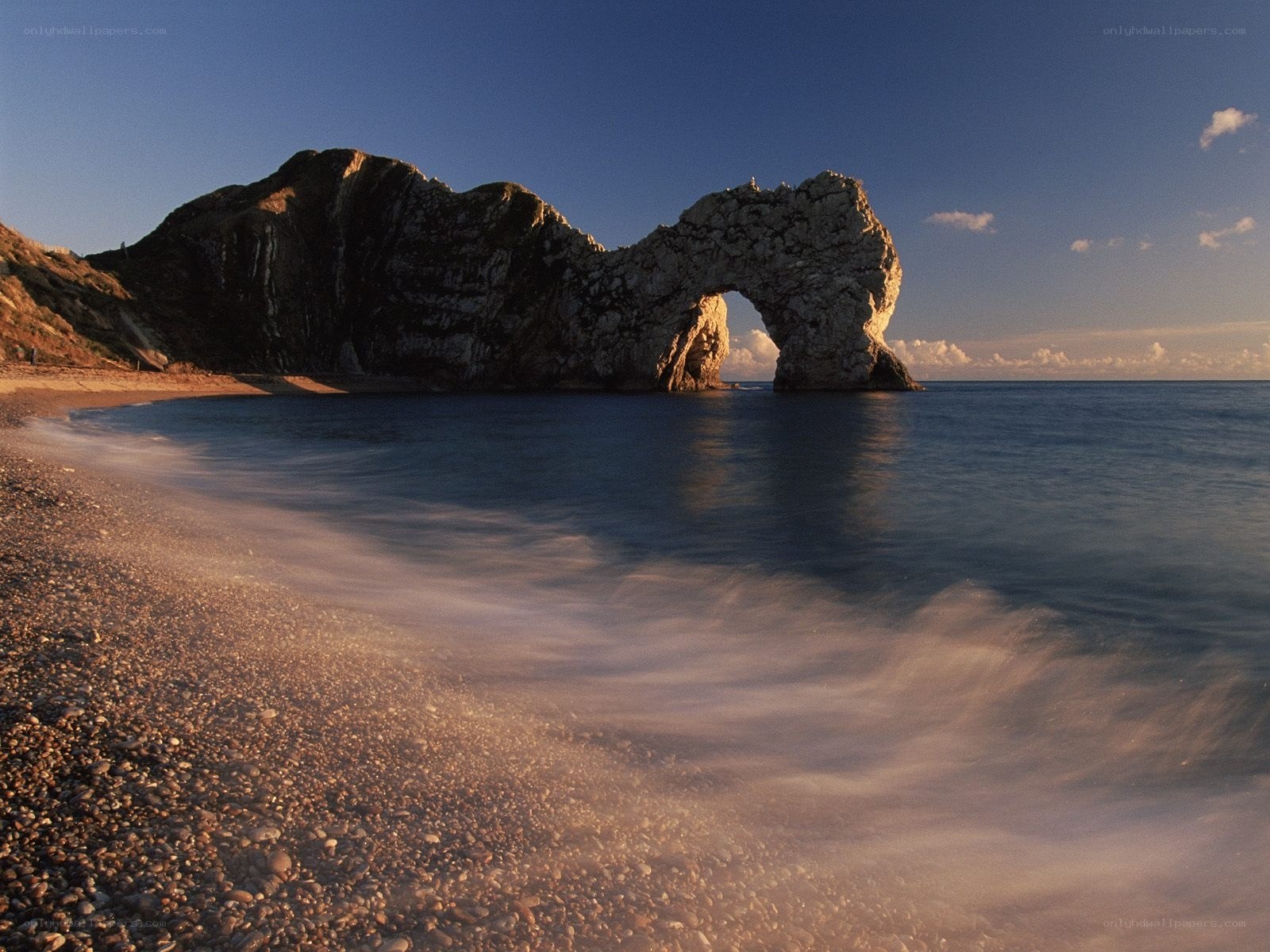 Durdle Door rock arch at sunset