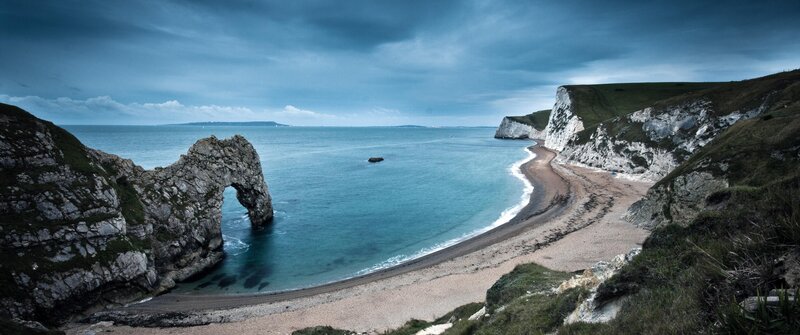 Durdle Door Rock Arch — Blue, Dramatic, Photograph