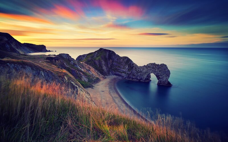 Durdle Door Rock Arch — Blue, Dramatic, Sunset, Photograph, Cliffs