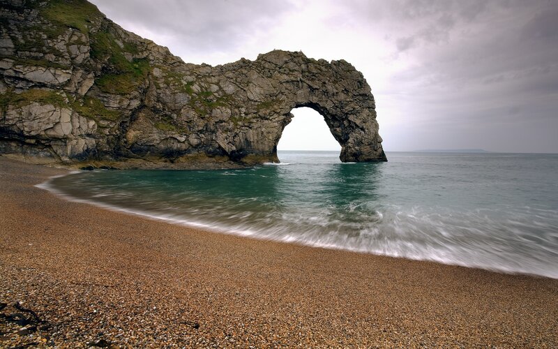 Durdle Door Rock Arch — Brown, Dramatic, Photograph, Beach