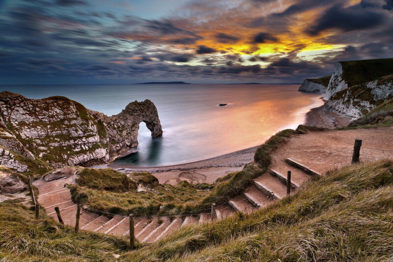 Durdle Door Rock Arch — Orange, Dramatic, Sunset, Photograph, Cliffs