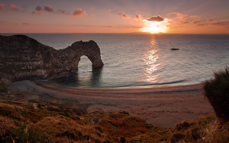 Durdle Door Rock Arch — Orange, Serene, Sunset