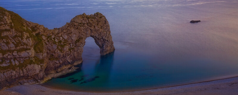 Durdle Door sea arch at dusk
