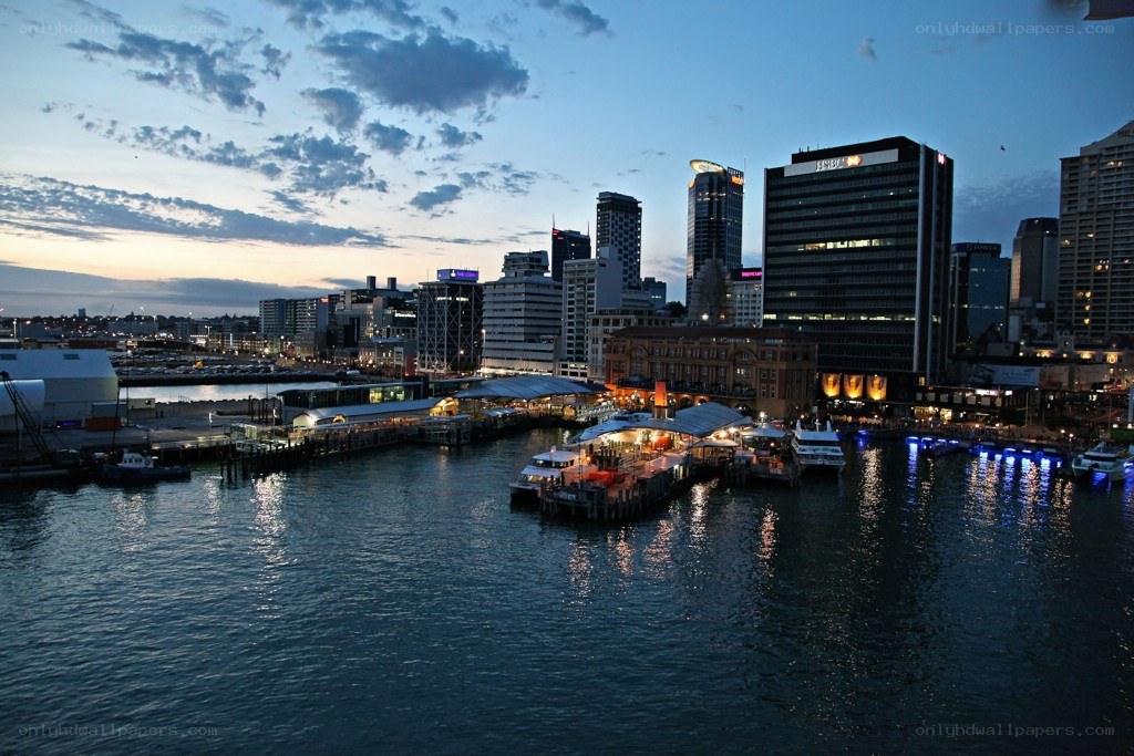 dusk at a city harbor