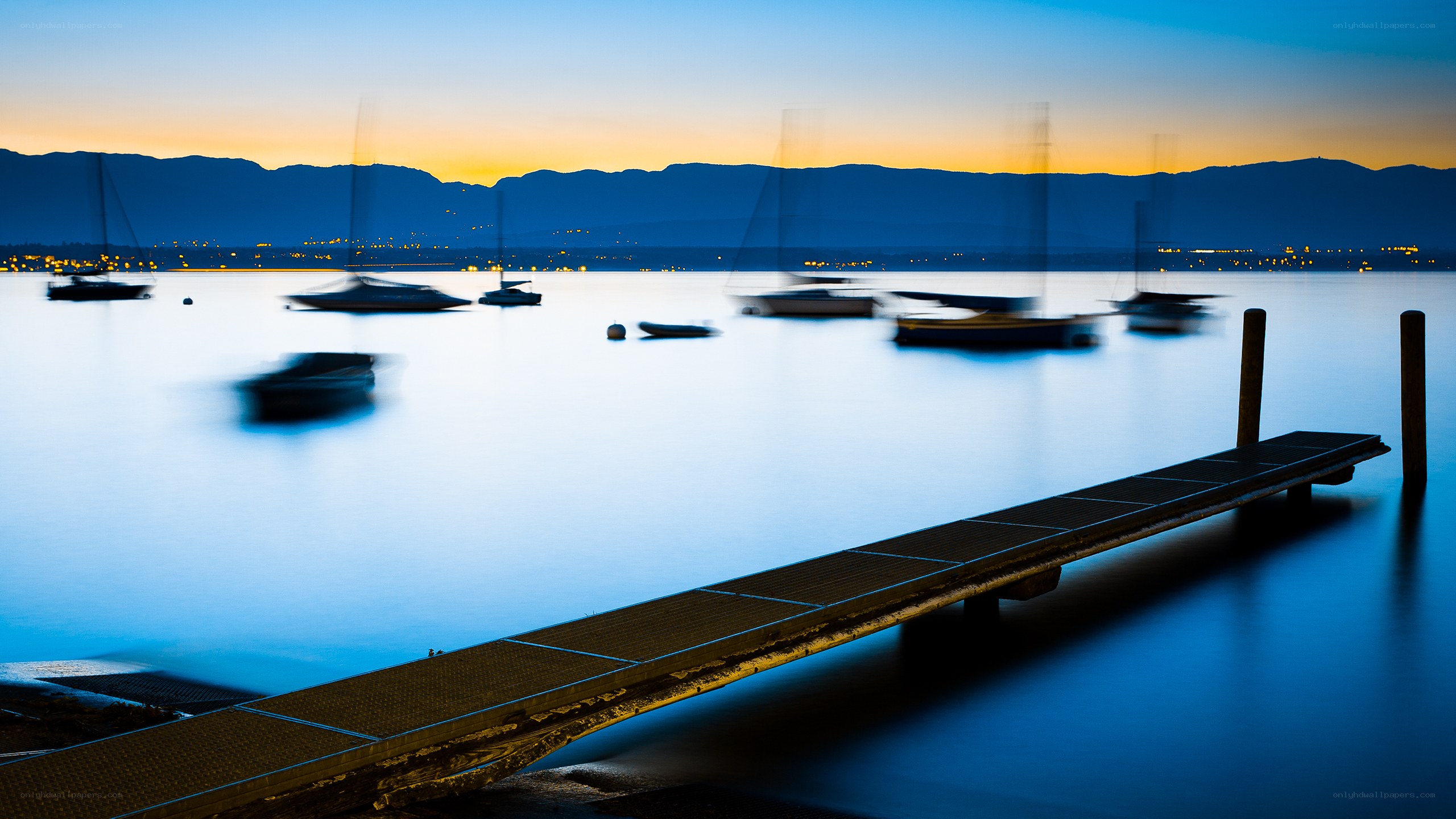 Dusk at the lake with boats