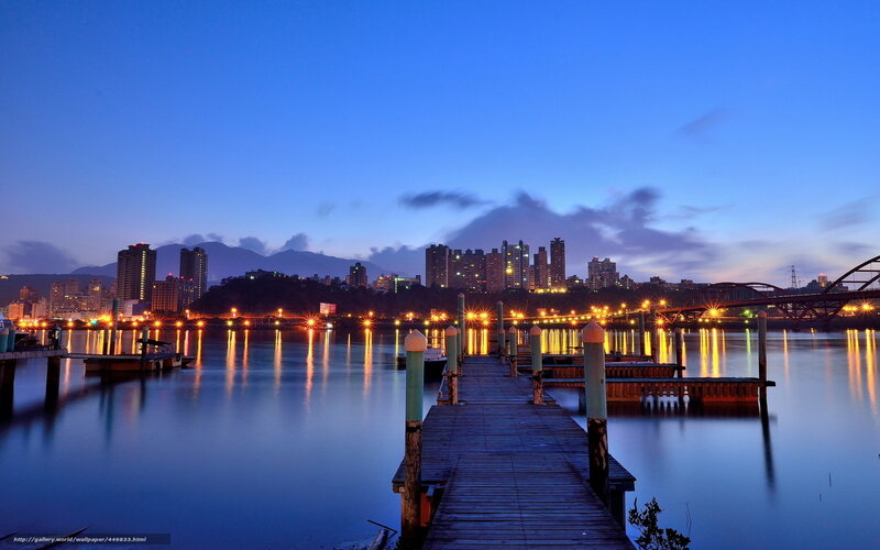 dusk cityscape by the river