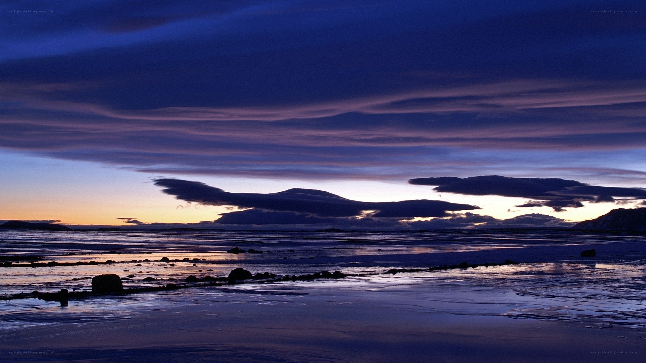 Dusk over a frozen shoreline