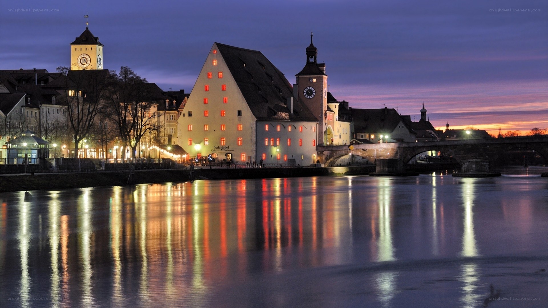 Dusk over a riverside town
