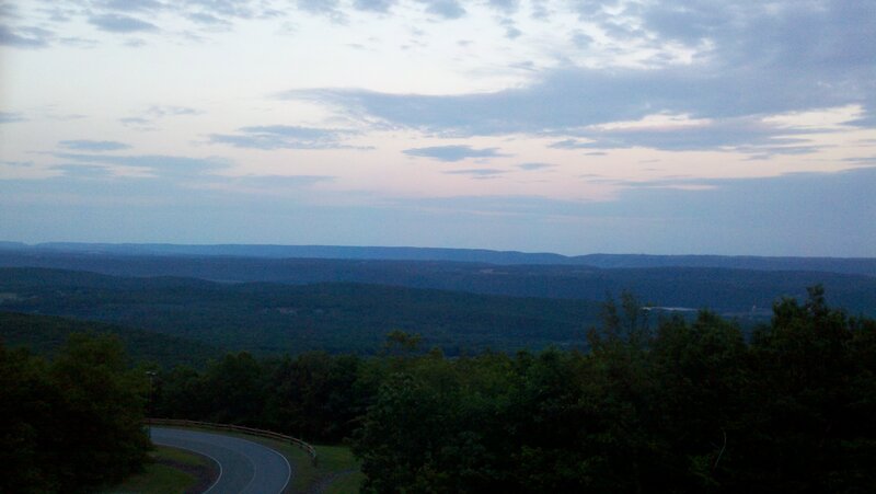 dusk over rolling hills
