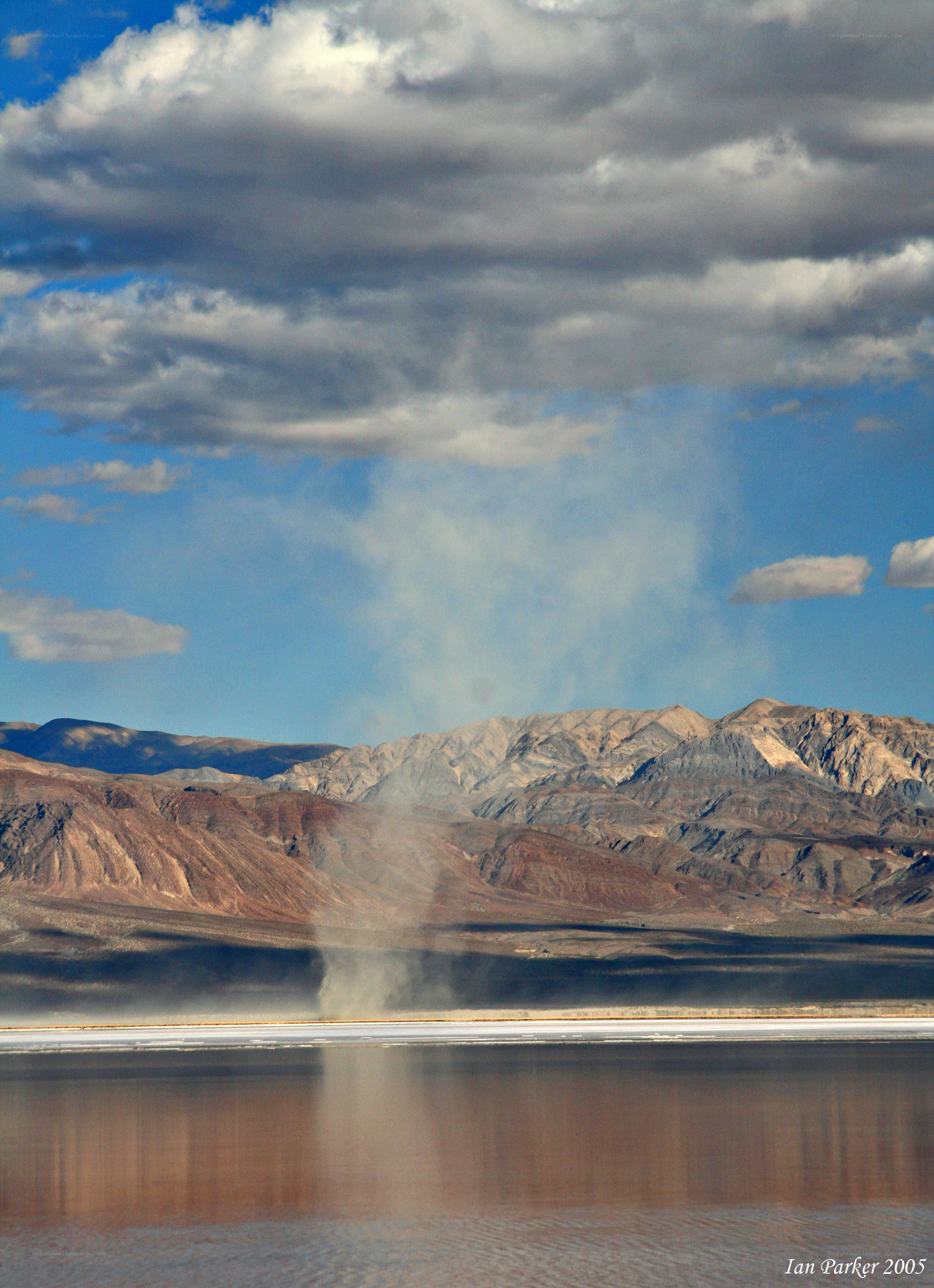 Dust devil over salt flat