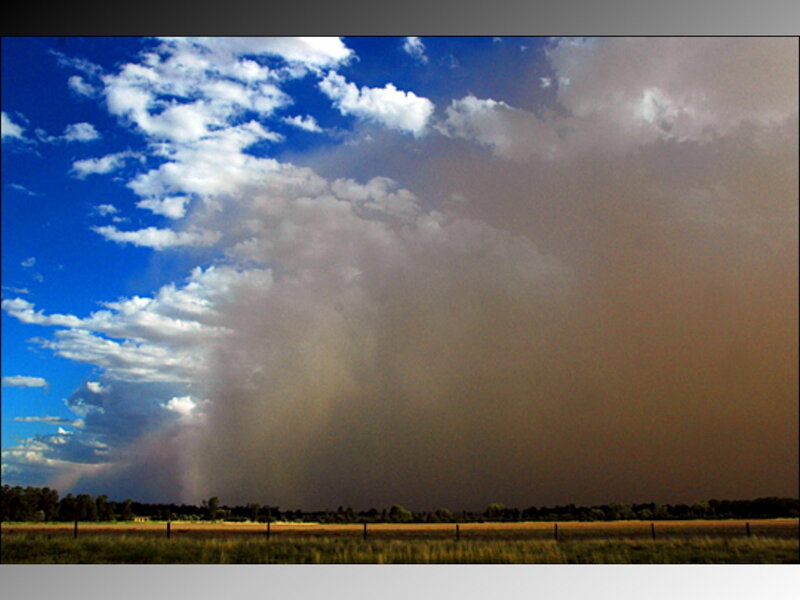 Dust storm over a field