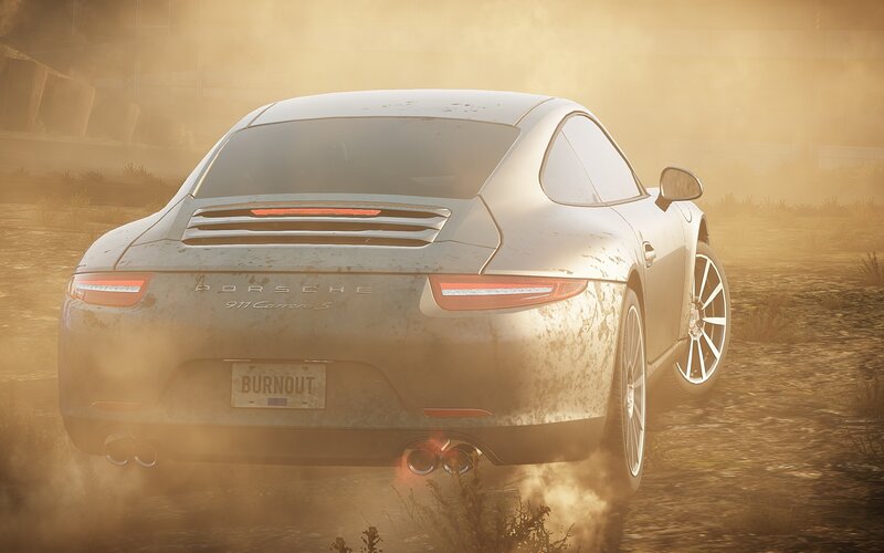 dusty porsche in a dusty field