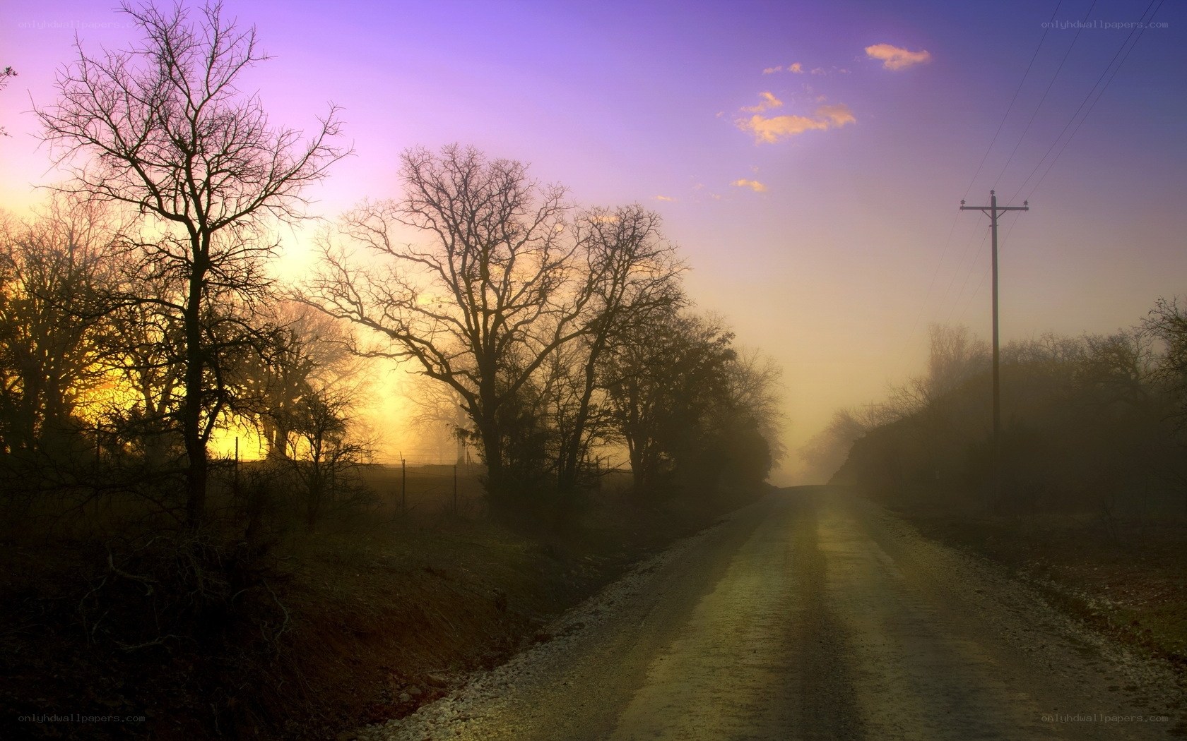 Dusty road at sunrise