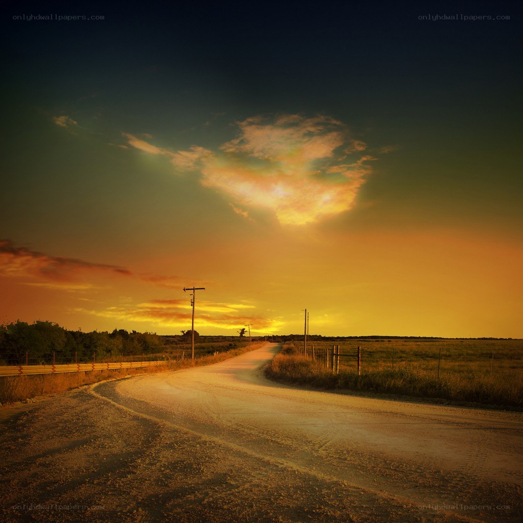 Dusty road at sunset