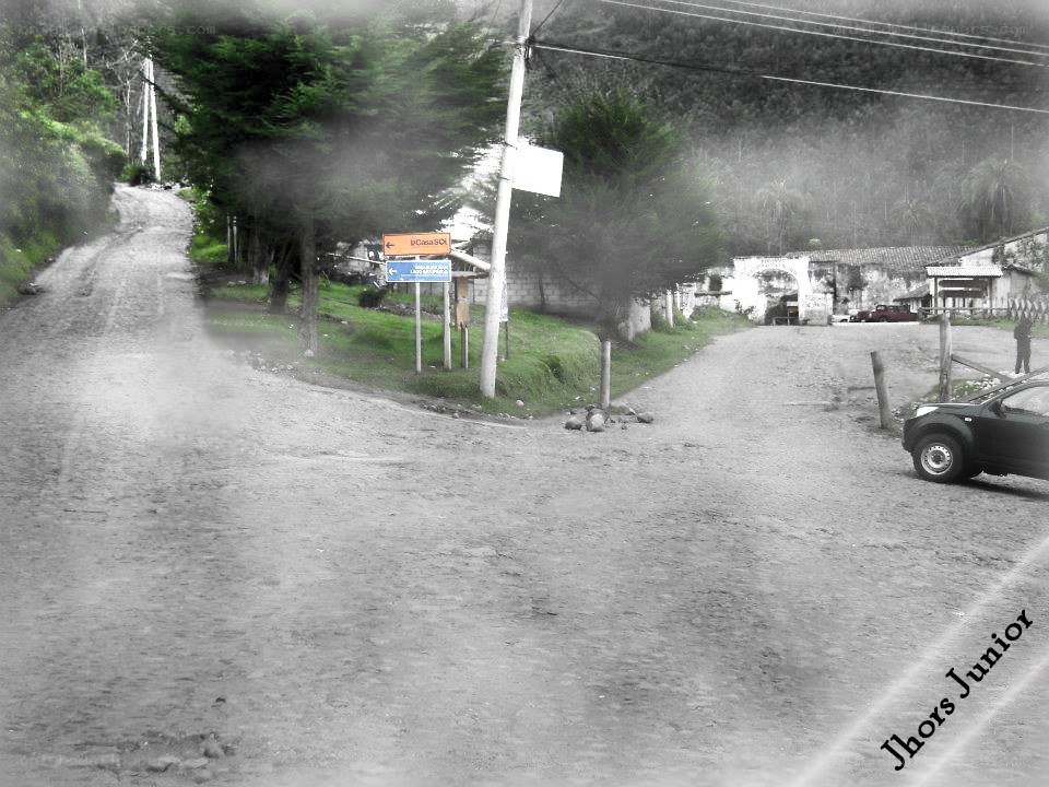 Dusty road intersection in a village