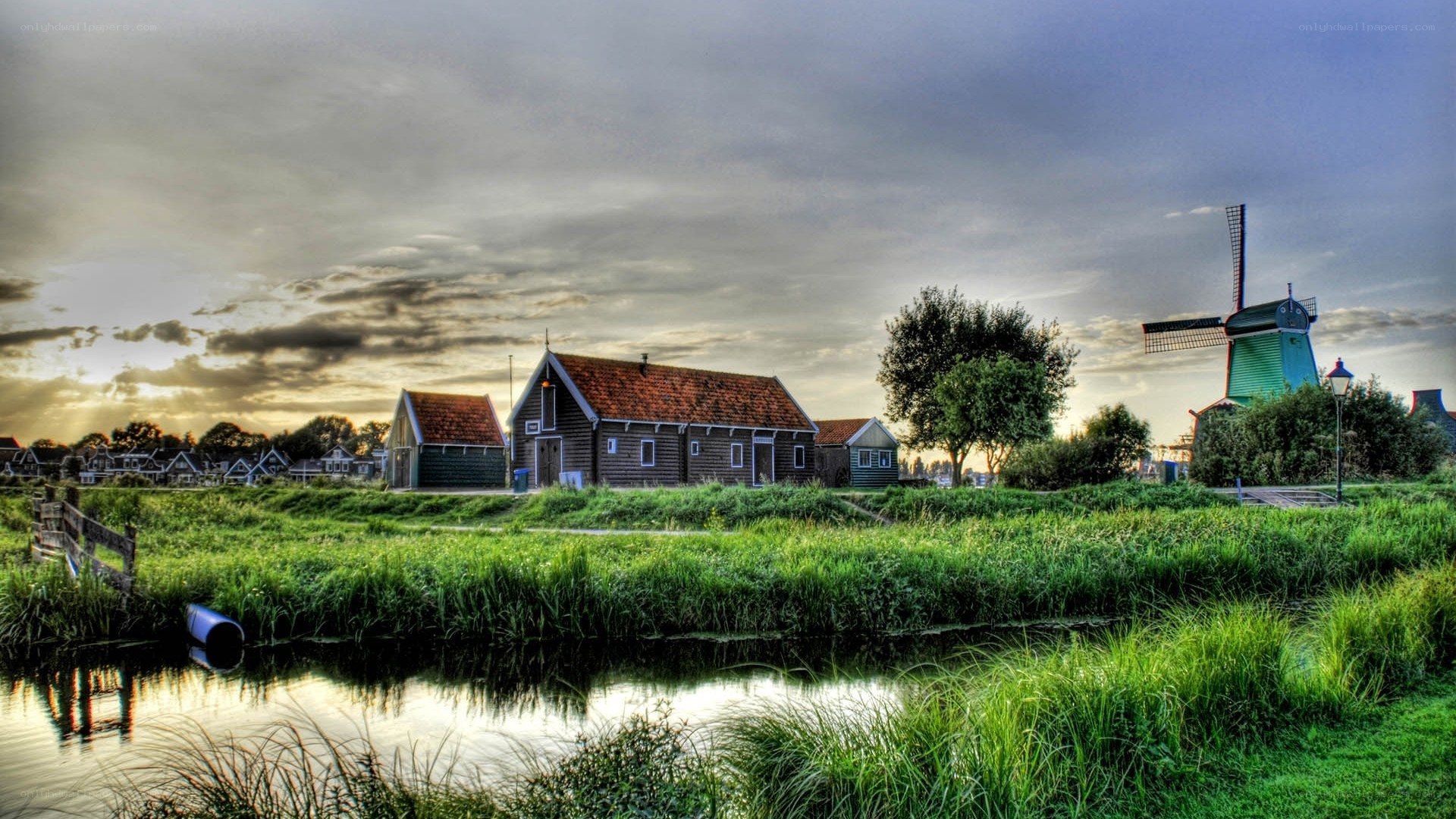 Dutch windmill by canal