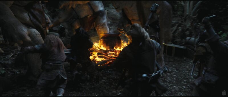 dwarves around a campfire