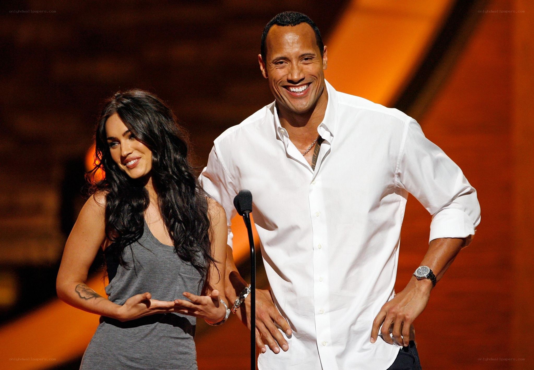 Dwayne Johnson and Megan Fox on stage