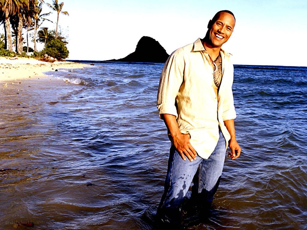Dwayne Johnson on a tropical beach