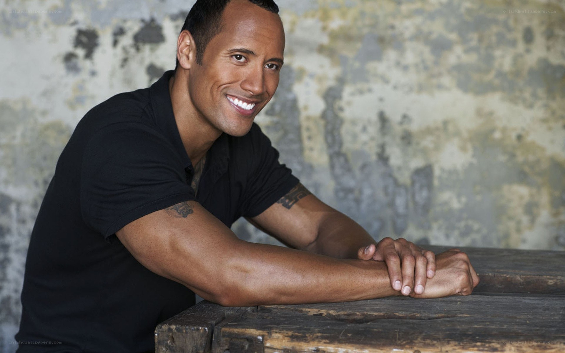 Dwayne Johnson smiling at camera