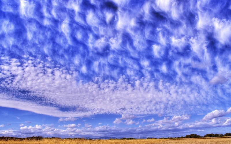 Dynamic sky over a field