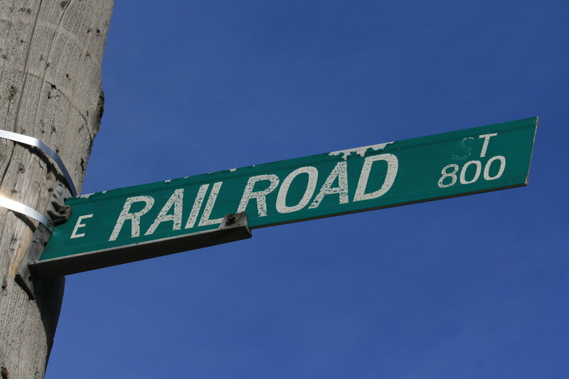 E Railroad St street sign