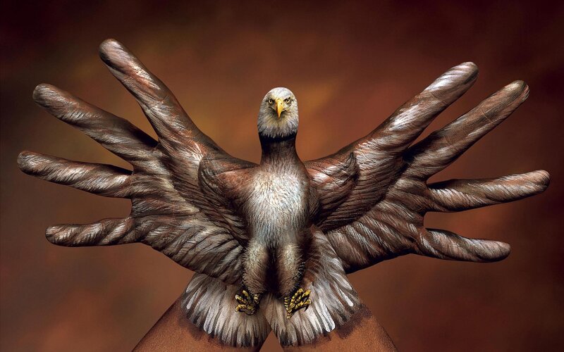 Eagle painted on hands
