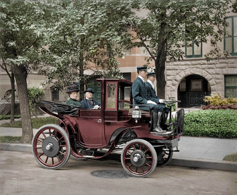 Early 20th-century automobile with passengers