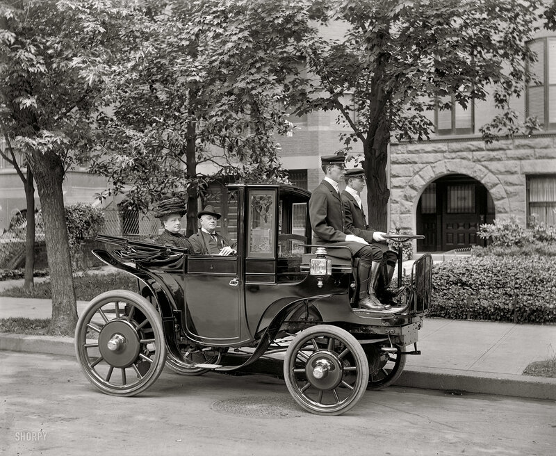 Early 20th-century automobile with passengers