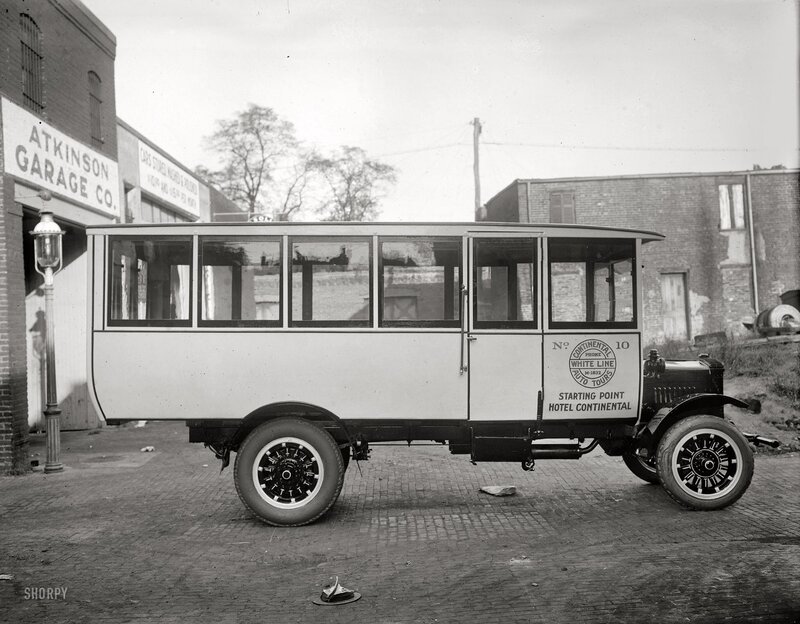Early 20th-century bus parked on street
