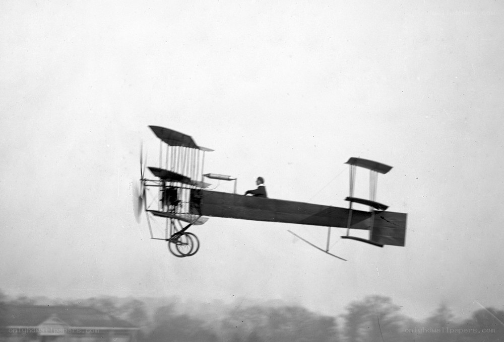 Early airplane in flight