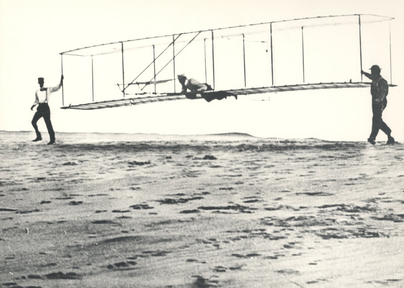 Early airplane on beach