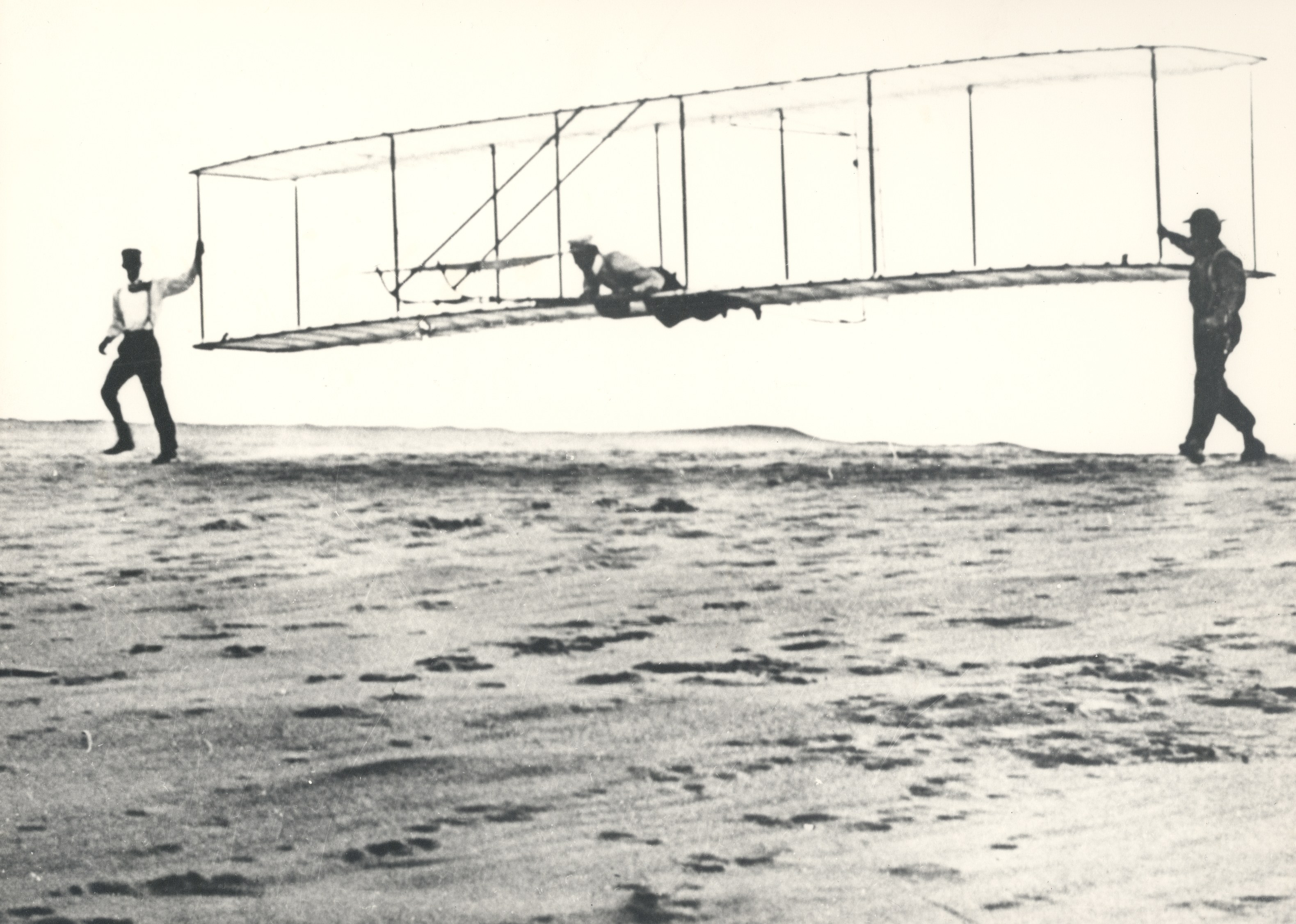 Early airplane on beach