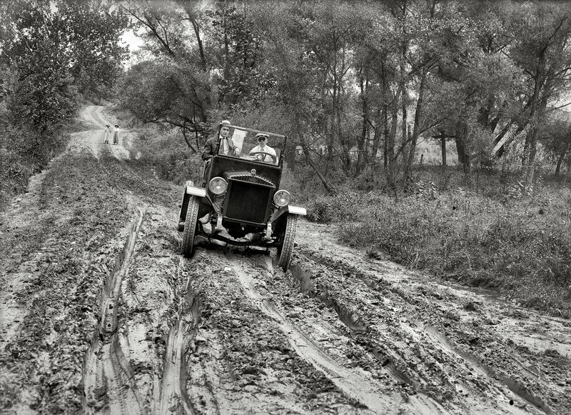 Early car on muddy road