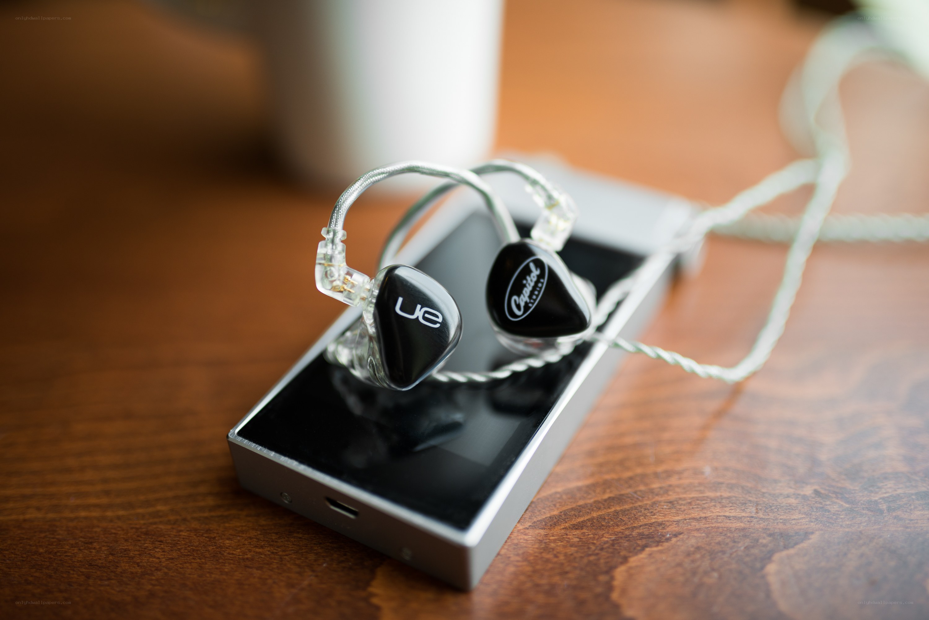 earphones on music player
