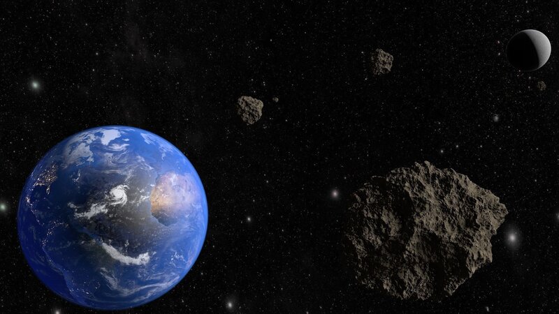 Earth and Asteroids in Space