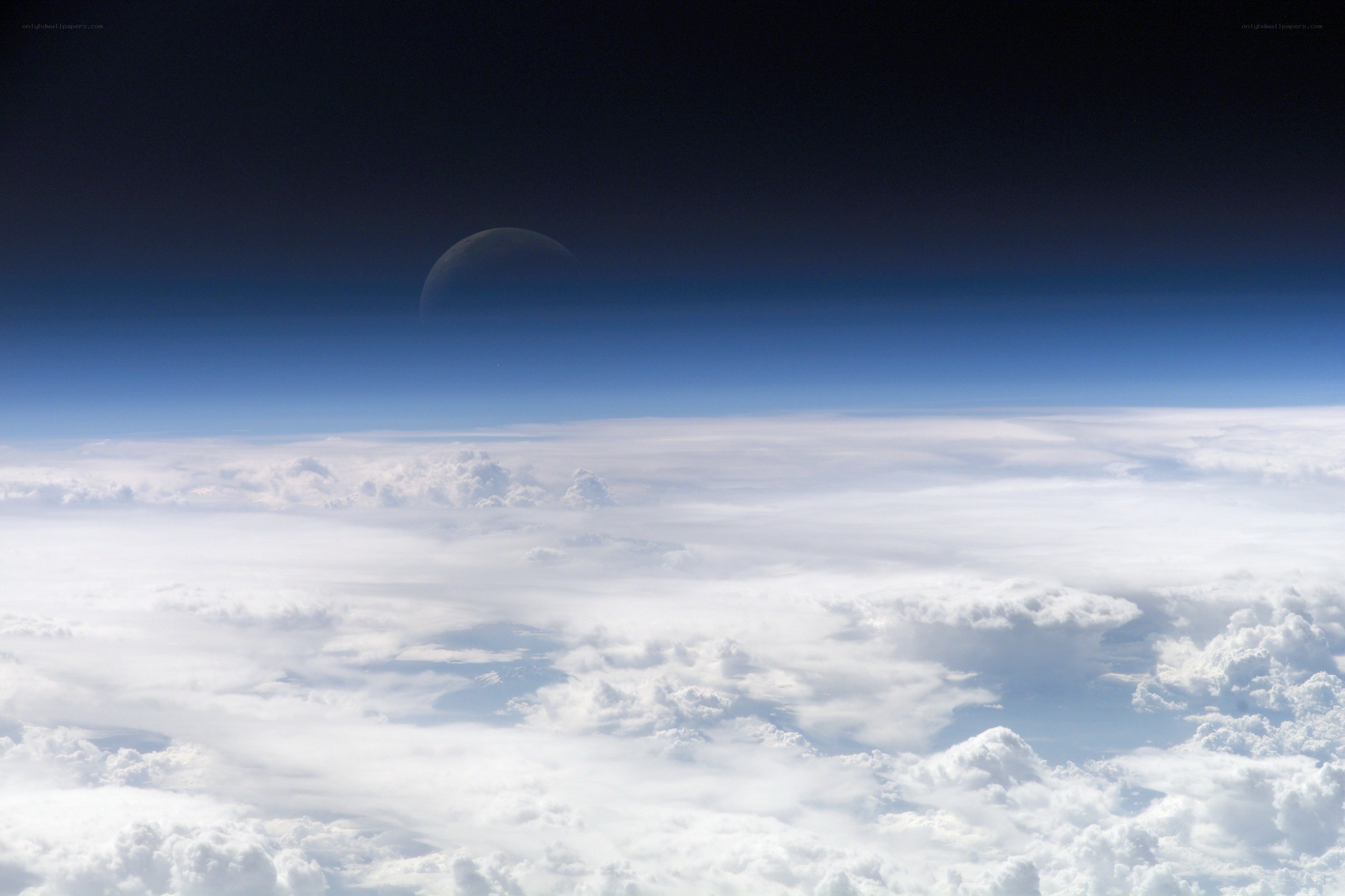 Earth from above with moon